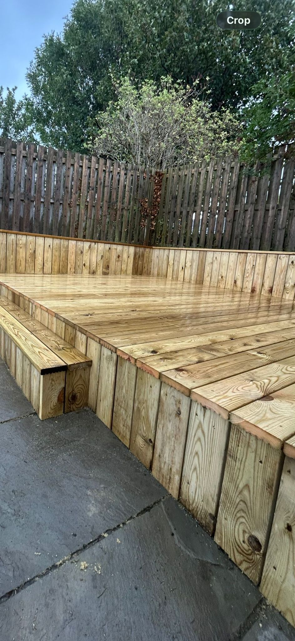 Sleeper retaining wall with timber bench seat